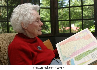 elderly woman reading
