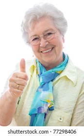 Elderly woman shows thumbs up sign  isolated on white