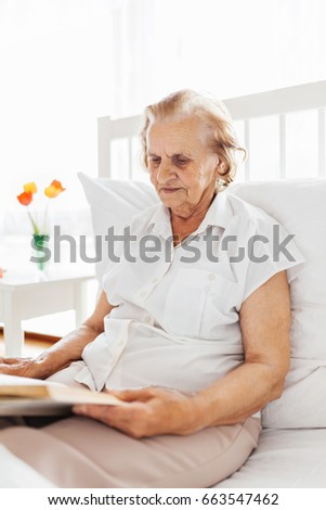 Similar – Female doctor comforting older female patient