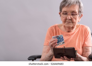 Elderly Woman Sitting Counting Her Money Stock Photo 526469683 ...