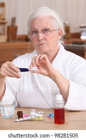 Elderly Woman Taking Her Medication