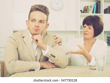 Elderly Woman Tries To Persuade Young Man Don't Worry