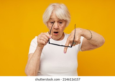 Elderly Woman Vision Problems With Glasses Yellow Background