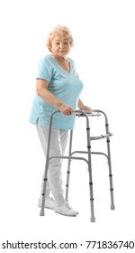 Elderly Woman With Walking Frame On White Background