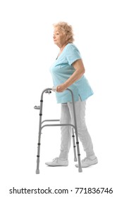 Elderly Woman With Walking Frame On White Background