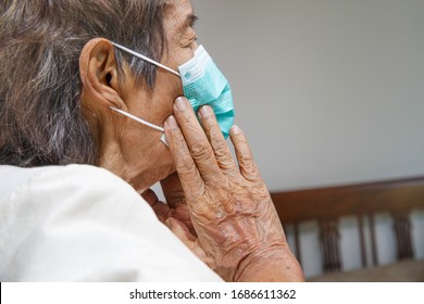 Elderly woman wearing a mask to protect from coronavirus covid-19