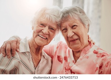 Elderly women, friends and hug in house with smile in portrait for care, love or bonding with reunion. Senior people, embrace and happy for connection in morning, lounge or together in nursing home - Powered by Shutterstock