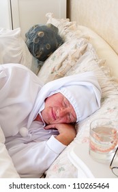 Eldery Couple In Vintage Nightwear Asleep In Bed