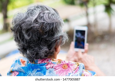 Eldery Woman Using Mobile Phone