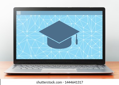 E-learning concept image. Laptop computer on wooden desk. Application on screen. Front view image.