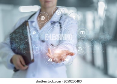 E-learning concept in medicine. Doctor shows the structure of the E-learning on a blurred background.