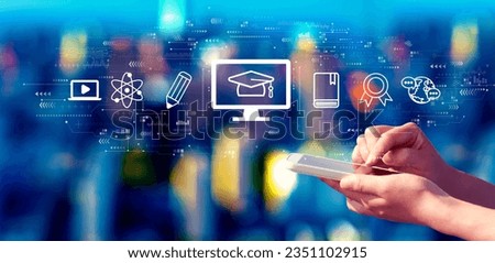 E-learning concept with person using a smartphone in a city at night