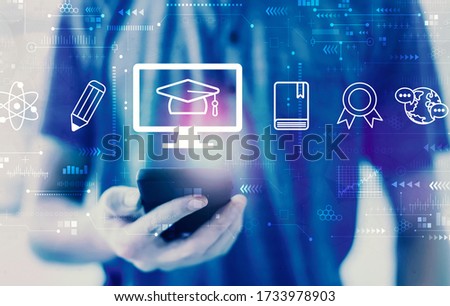 E-learning concept with young man using a smartphone
