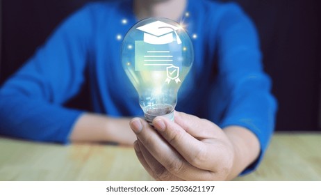 E-learning digital education, online courses, hand of robotic holding glowing E-learning in light bulb on big data processing.learning, innovation and technology. - Powered by Shutterstock