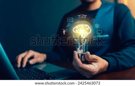 E-learning education, internet lessons and online webinar. Man holding lightbulb showing graduation hat, Internet education course degree study knowledge to creative thinking idea and problem solution