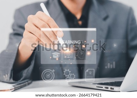 E-learning education, video tutorial, internet lessons and online course application, Businessman or learner using online lessons via laptop on digital screen.