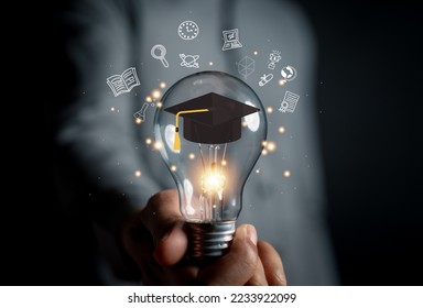 E-learning graduate certificate program concept. man hands showing graduation hat, Internet education course degree, study knowledge to creative thinking idea and problem solving solution - Shutterstock ID 2233922099