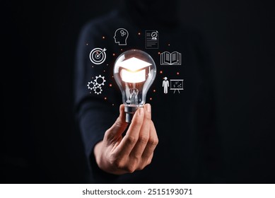 E-learning graduate certificate program concept. man holding lightbulb showing graduation hat, Internet education course degree, study knowledge to creative thinking idea and problem solving solution