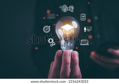 E-learning graduate certificate program concept. Man holding lightbulb showing graduation hat, Internet education course degree, study knowledge to creative thinking idea and problem solving solution.