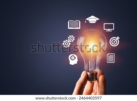 E-learning graduate program, hands showing light bulb