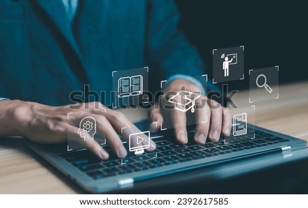 e-learning icon on a virtual screen in a laptop. concept learning,  training digital online, and course education. webinar technology, library on the internet website, lesson learning e-book