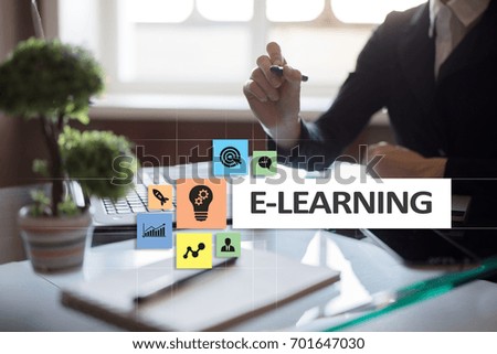 E-Learning on the virtual screen. Internet education concept.