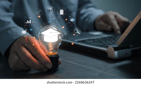 E-Learning Postgraduate Diploma Program Concepts. hand holding light bulb showing graduation cap internet education creative and Study work knowledge and business ai, problem solving, brainstorming.