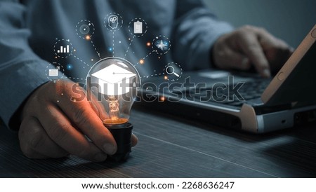 E-Learning Postgraduate Diploma Program Concepts. hand holding light bulb showing graduation cap internet education creative and Study work knowledge and business ai, problem solving, brainstorming.