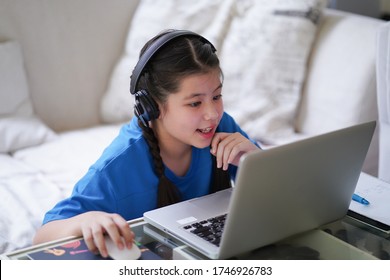 E-learning tween girl online study at home computer