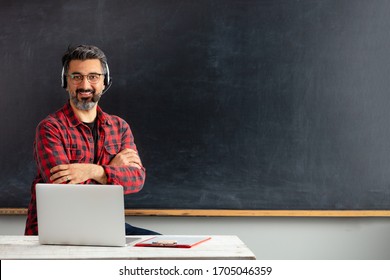 E-Learning/Online Education. Adult Man Teacher Teaching With Online At Internet.