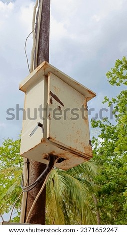 Electeonic panel box corrotion at outdoor beach with blue sky in background