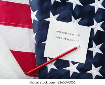 An Election Ballot And A Pencil Against The Background Of The National American Flag. Patriotism, Civic Duty, Right And Freedom Of Choice. Low Angle View.