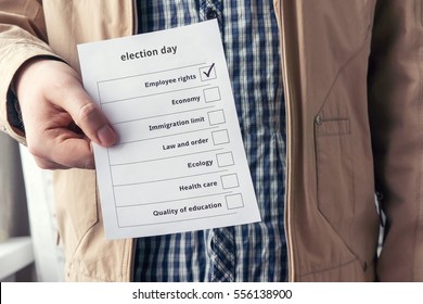 Election day. Selection of social issues on voting. Voter holding a form for voting. 