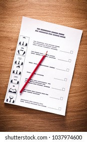 Election of the presidential candidate. Presidential elections. List of selections, put a tick, pen, pencil on wooden background
