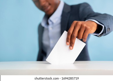 Elections in america USA 2020, 3 of november. African man voted on president elections, blurred background