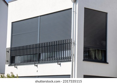 Electric aluminium roller shutter on a new residential building - Shutterstock ID 2317335115