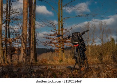 Electric bike in winter forest with blue sky and sunny shine in south Bohemia - Shutterstock ID 2119252469