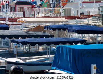 Electric Boat Canopies At The Fun Zone On The Balboa Newport Beach Peninsula In California