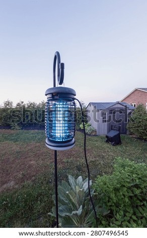 An electric bug zapper for outdoors