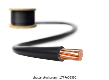 Electric Cable On White Background. Copper Wire Is The Electric Conductor Of Urban Society.