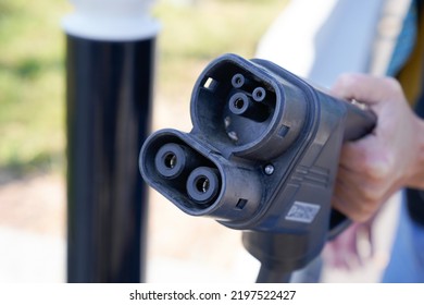 Electric car charger plug DC - CCS combo type 1 electric ev socket charging - Shutterstock ID 2197522427
