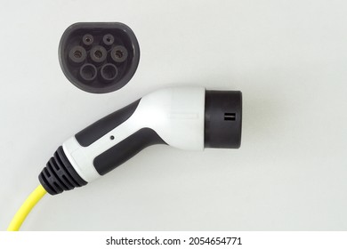 Electric Car Charger Plug Type 2 On White Background, EV Charging Connector Type 2