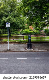 Electric Car Charging Point In Suburbia.