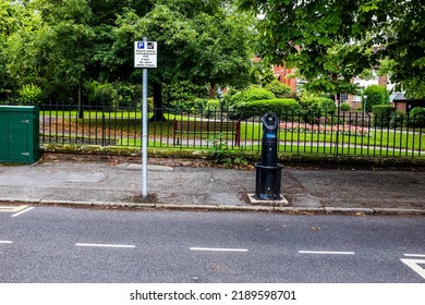 Electric Car Charging Point In Suburbia.