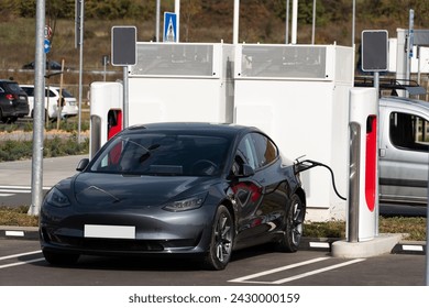 Electric car with a charging station