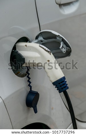electric car at charging station