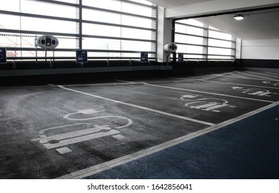 Electric Car Charging Station In Indoor Parking Garage