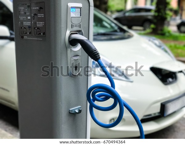 Electric car charging station in Oslo. Eco\
automobile that sparked a\
revolution