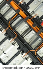 Electric car lithium battery pack and wiring connections internal between cells on background. Lithium-ion battery technology in EV car