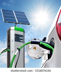 Electric Car On Charging Station With Solar Panels With Back Light, Solartankstelle